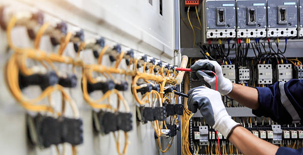 Professional Electrician technician working in Berkeley Lake, GA